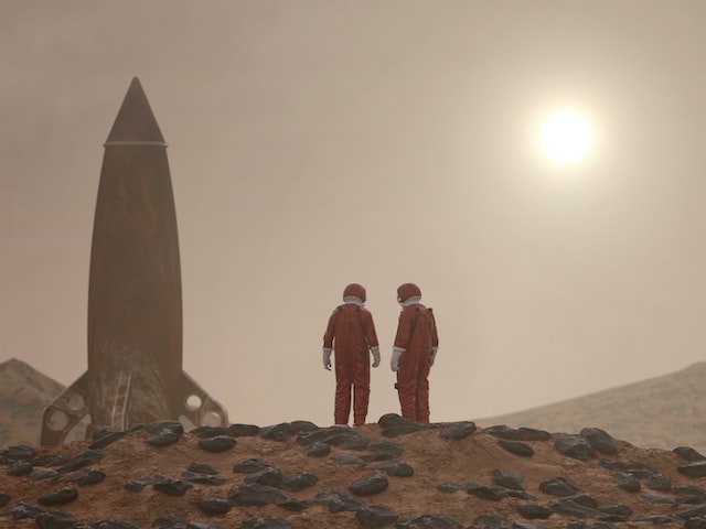 Landed rocket with two astronauts